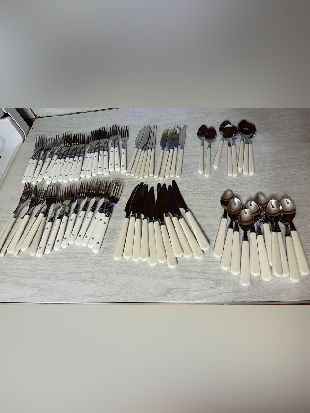 White Handle Stainless Flatware Set - Knives, Forks, Spoons